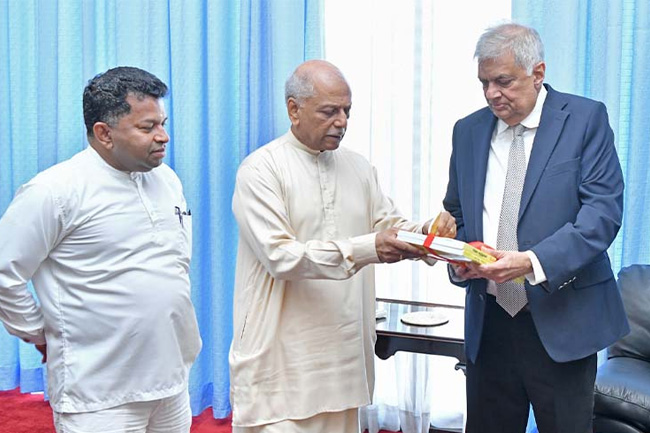President presented with Sinhala & Tamil font books for International Mother Language Day