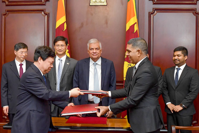 Chinas Sinopec signs contract agreements to enter fuel retail market in Sri Lanka