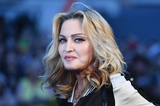 Madonna hospitalized for several days, tour postponed