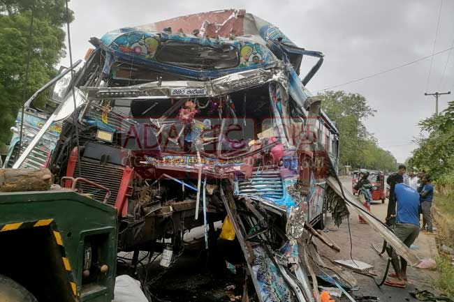 Two dead, 29 injured as bus crashes into container truck