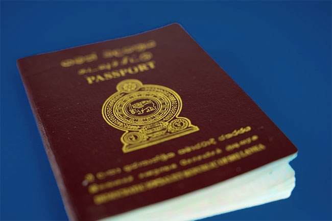Woman arrested with 04 passports at BIA