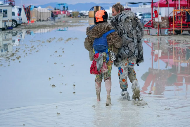 More than 70,000 Burning Man festival attendees remain stuck in Nevada desert after rain