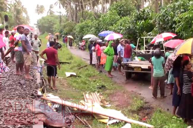 One dead, another critical after lorry collides with train in Meetiyagoda