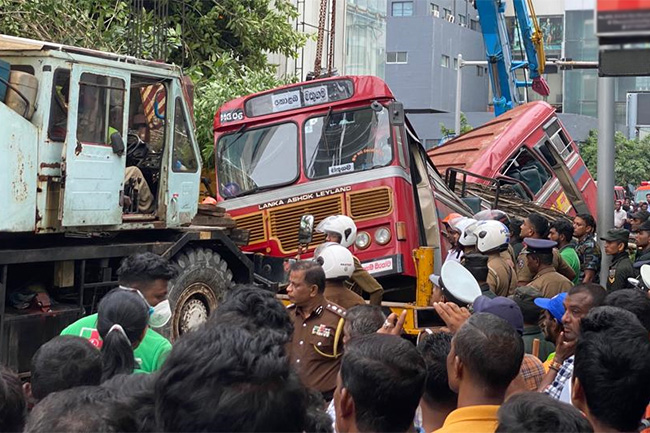 At least 17 injured after tree falls on a bus in Colombo