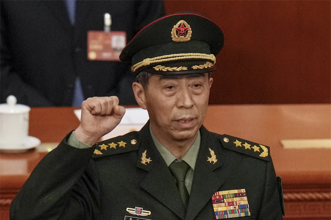 China ousts defence minister after two-month public absence