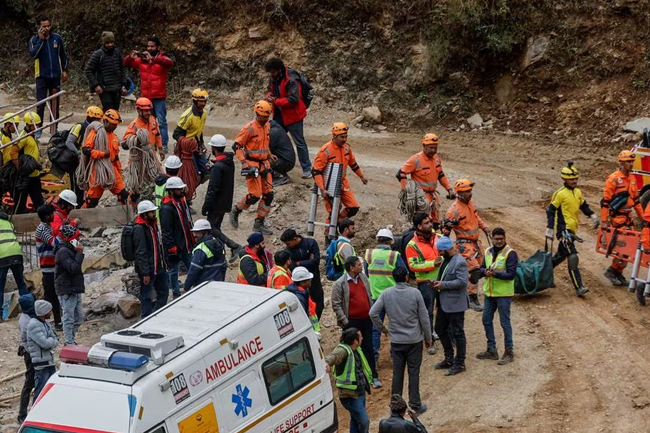 Indian rescuers drill through debris to reach 41 men trapped in tunnel