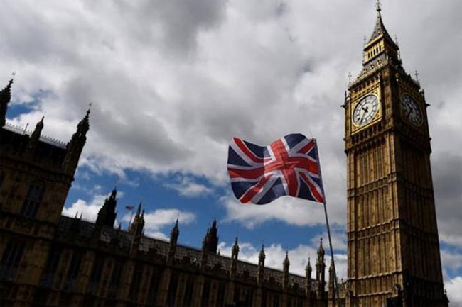 UK unveils tougher visa rules in a bid to cut migration