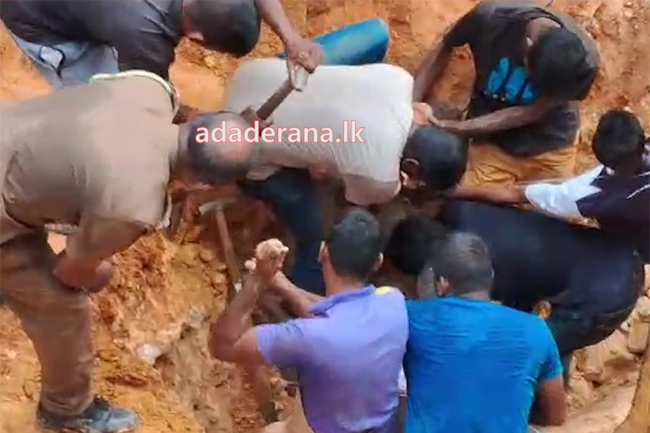 One dead, two rescued in earth slip at construction site in Karapitiya