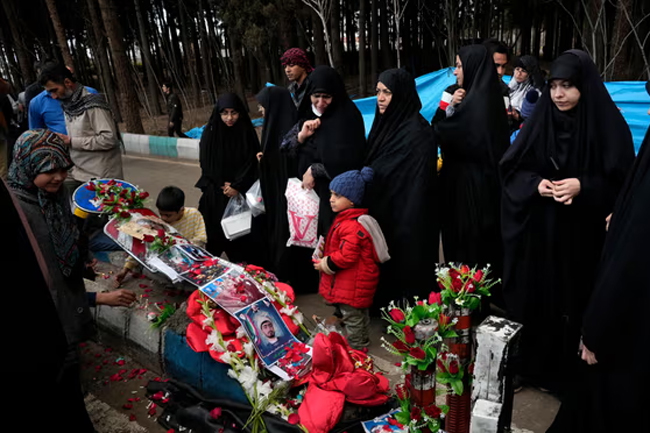 IS claims responsibility for deadly Iran bombings that killed 84