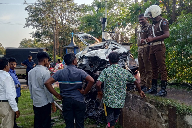 Four persons critically injured in car-train collision 