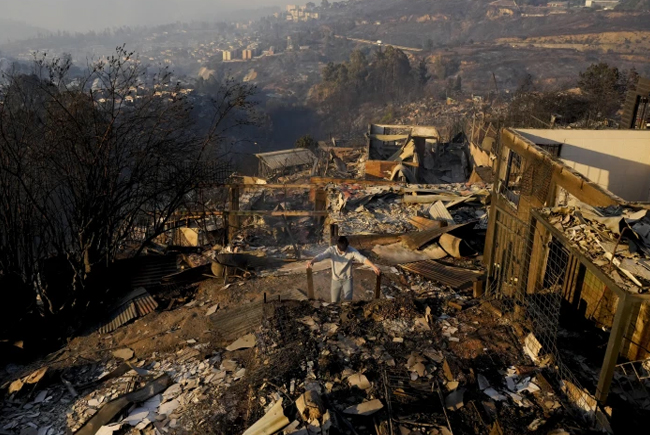 46 reported dead in Chile as forest fires move into densely populated central areas