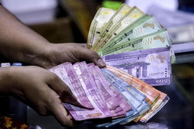 Sri Lanka approves lifting some limits on rupee conversion for outward remittances
