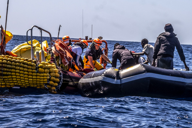 Sixty migrants feared drowned crossing Mediterranean from Libya