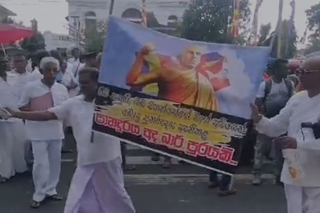 Galle Road blocked at Panadura due to protest against liquor shop