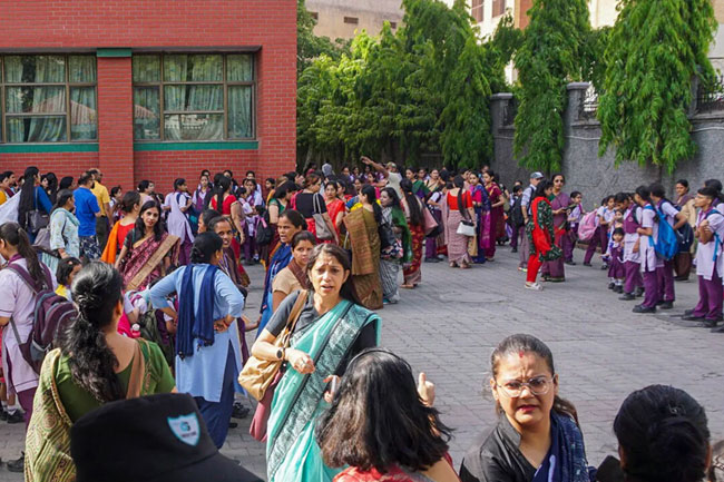 Fake bomb threats shut nearly 100 schools in Indian capital