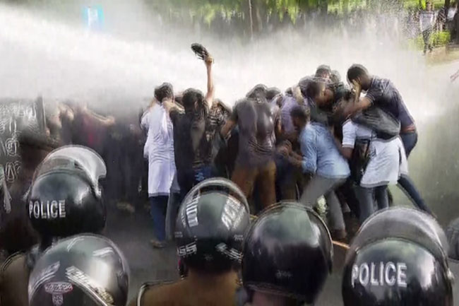 Police fire water cannons at protesting medical students