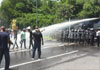 Police fire water cannons at protesting university non-academic staff