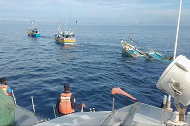 Navy rescue Sri Lankan fishermen from distressed local fishing trawler in eastern waters