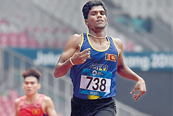 Sri Lanka�s Aruna Dharshana claims first place in China