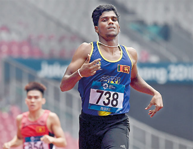 Sri Lankas Aruna Dharshana claims first place in China