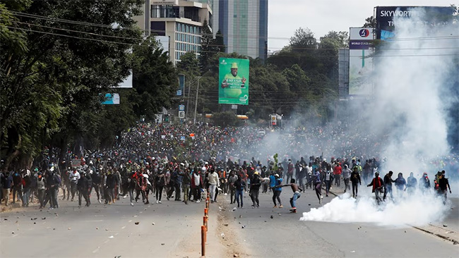 Anti-tax protesters storm Kenyas parliament, drawing police fire as president vows to quash unrest