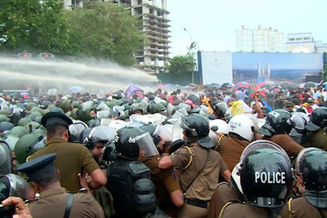 Police fire tear gas to disperse teacher-principal protest