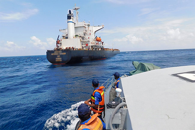 Navy vessel receives critical fisherman from merchant ship