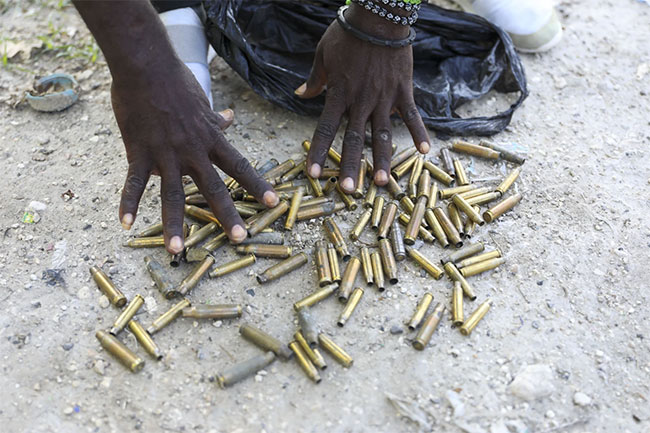 Another town in Haiti comes under attack a week after gangs killed at least 115 people