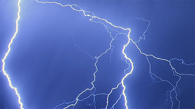 Motorcycle pillion rider killed by lightning strike