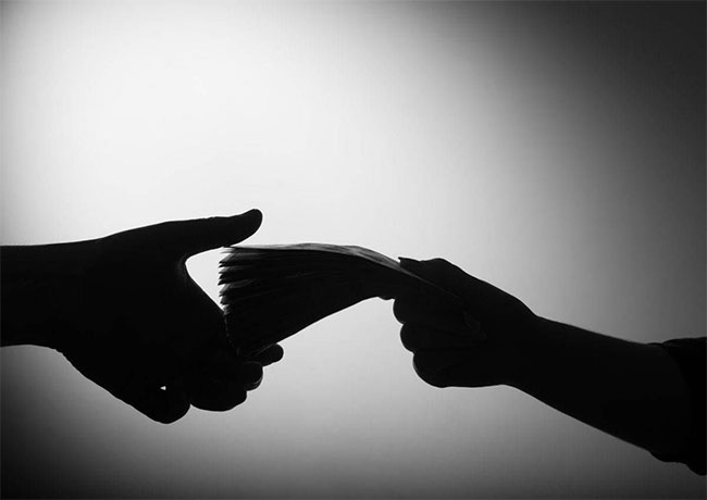 Female principal remanded over bribery charge
