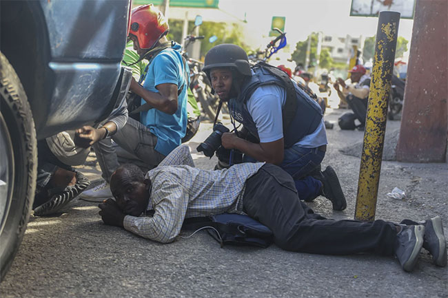 Haitis main airport shuts down as gang violence surges and a new prime minister is sworn in