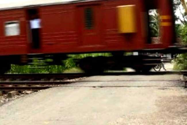 Motorcycle pillion rider killed in collision with a train