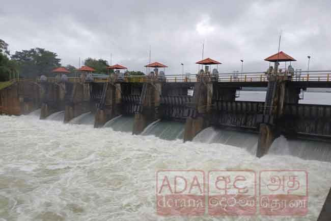 Sluice gates of Ratkinda reservoir opened, roads submerged