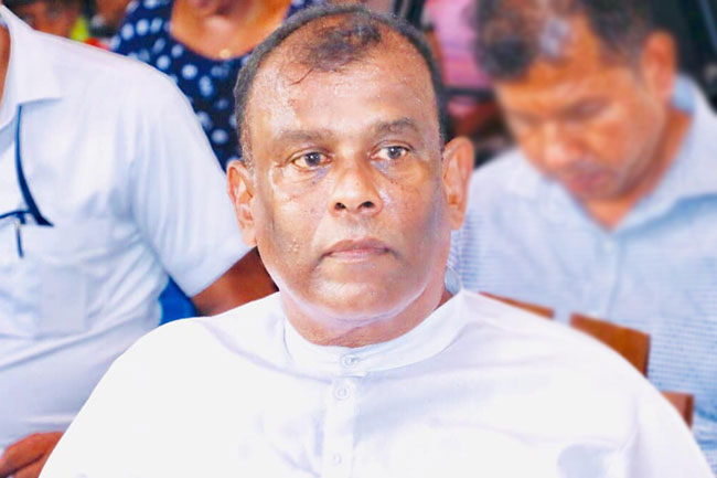 Former MP Shantha Abeysekara and son arrested