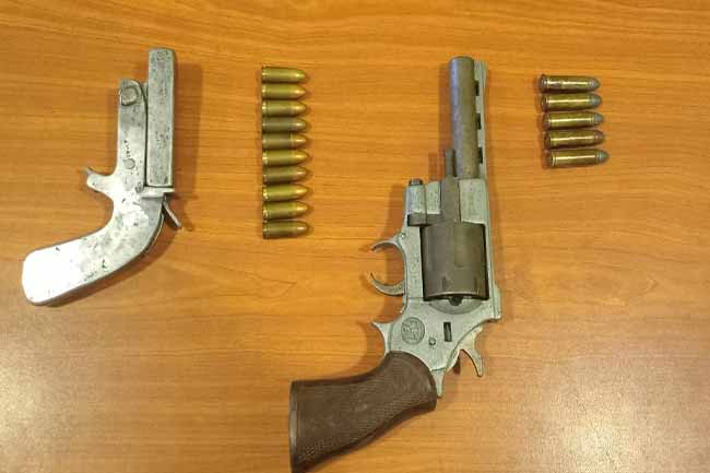 Two arrested over extortion of businessmen, firearms seized