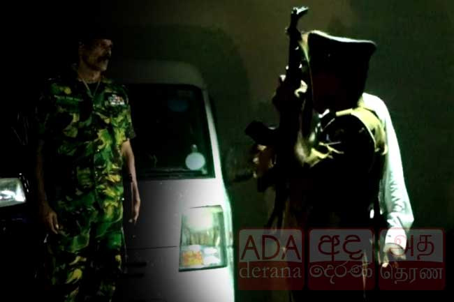 Police officer fires warning shot into the air in Matugama