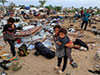 Israel airstrikes kill at least 130 in Gaza as negotiators seek ceasefire