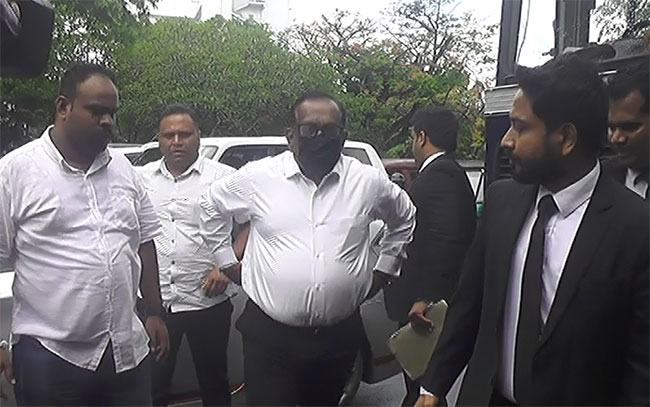 Ex-Minister Mahindananda Aluthgamage appears in court