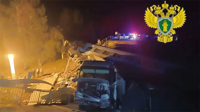 At least seven dead after Russian bridge collapses on to train