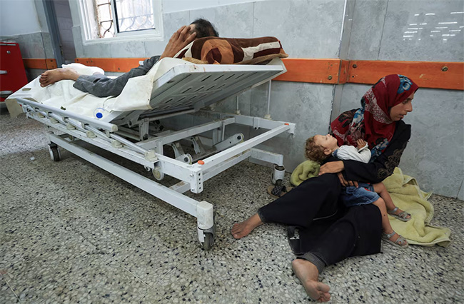 Israeli fire kills 60 in Gaza, many near aid site, medics say