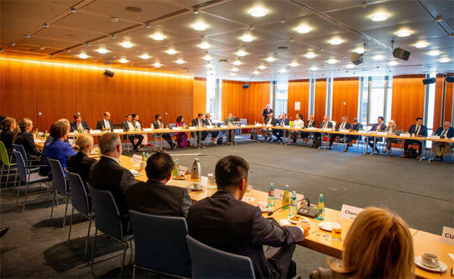 President attends business forum with leading German companies