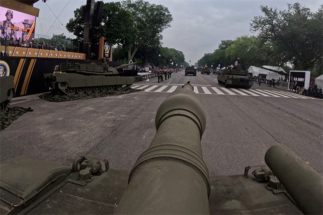 After day of nationwide protests, Trumps military parade rolls through D.C.