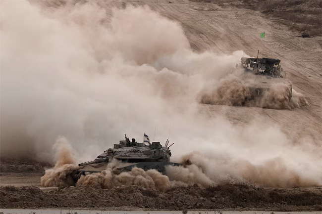 Israeli tanks kill 59 people in Gaza crowd trying to get food aid, medics say