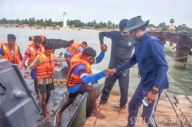 Navy steps in to rescue Indian fishermen from capsized boat off Talaimannar 
