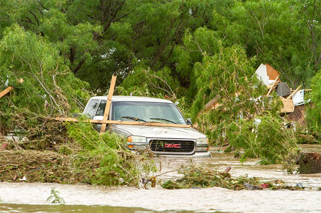 Death toll in Texas floods rises to at least 27 as search continues for many missing, officials say