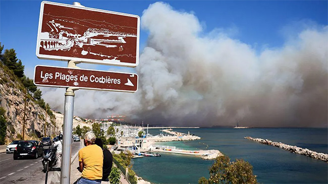 More than 100 hurt as efforts to contain Marseille wildfire continue