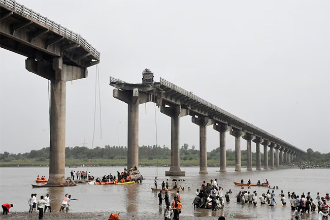 9 killed after vehicles fall into river as bridge collapses in Indias Gujarat