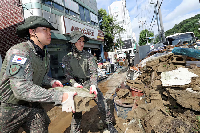 Death toll rises to 14 in South Korea as heavy rain triggers landslide and flooding
