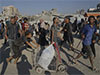 Israeli military says it will pause fighting in 3 areas of Gaza to address surging hunger