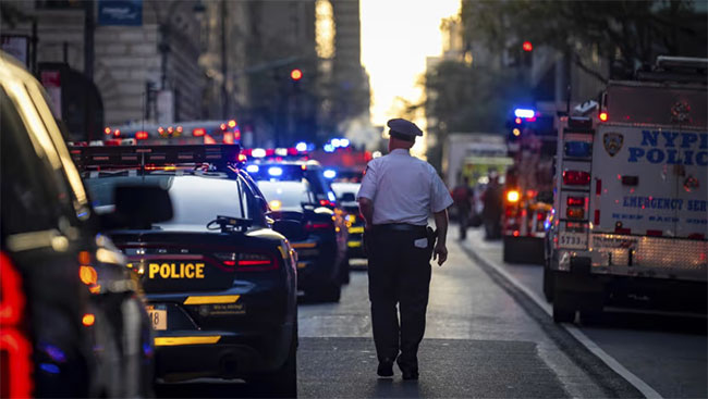 New York shooting: Four including police officer dead